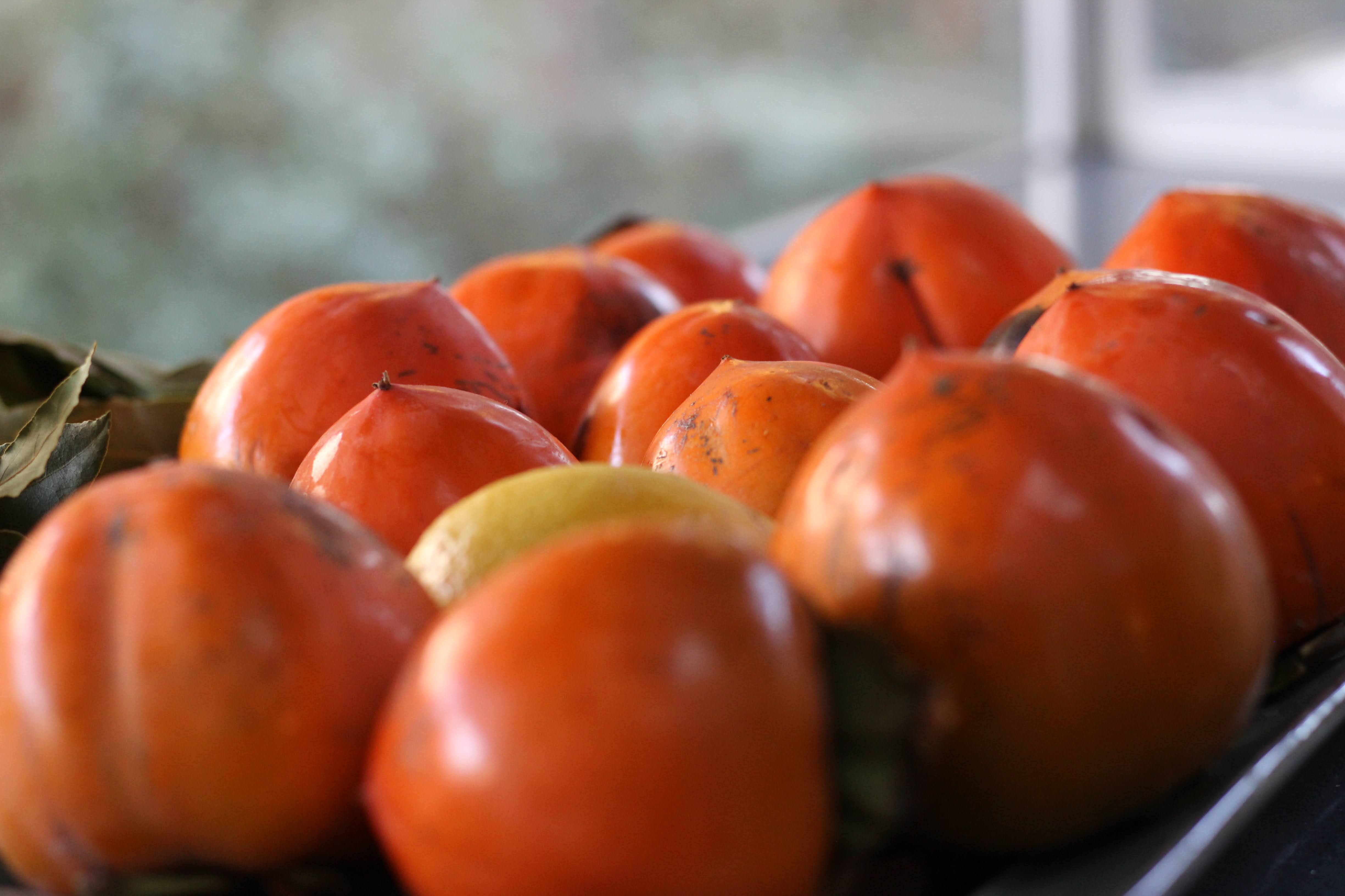 tray of persimmons
